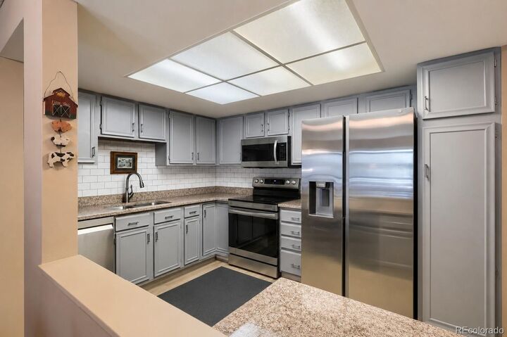 Property Photo:  14091 E Marina Drive 304  CO 80014 