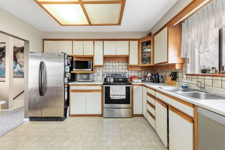 Property Photo:  3481 Dieppe Drive  BC V5M 4C8 