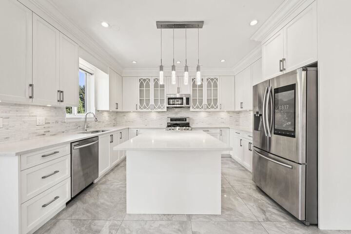 Property Photo:  1720 Sutherland Avenue  BC V7L 4B9 