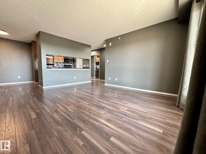 Property Photo:  2430 Guardian Road NW 514  AB T5T 6X9 
