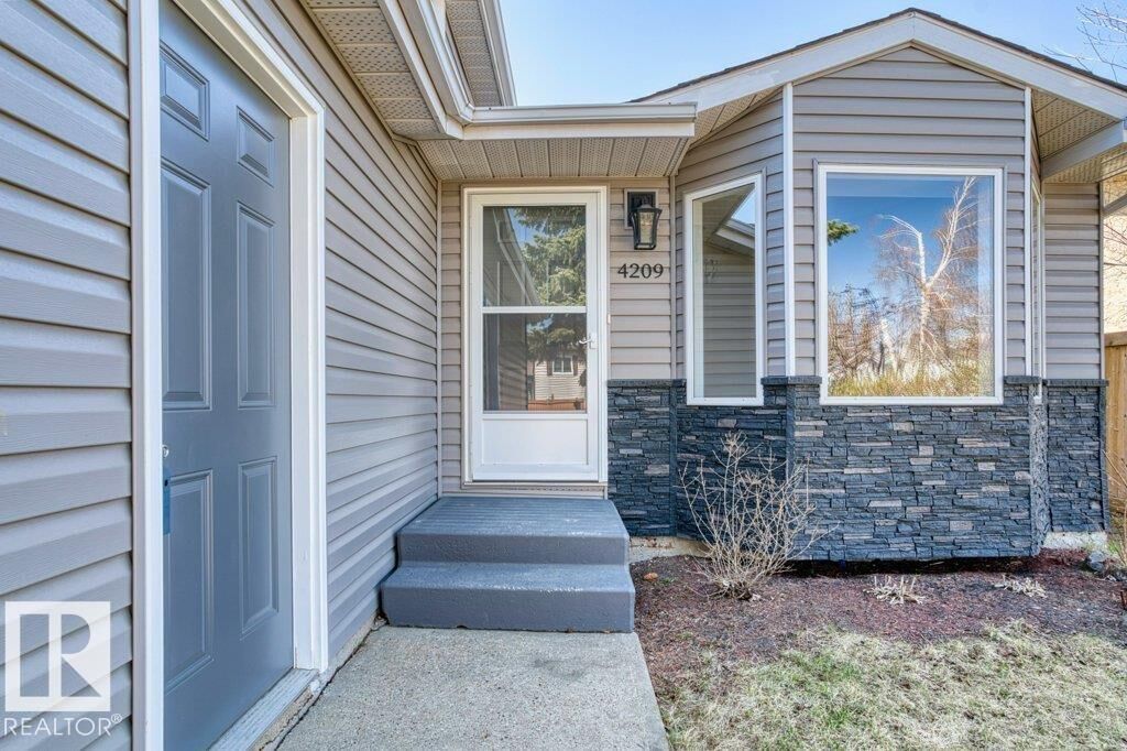 Property Photo:  4209 25 Avenue NW  AB T6L 6B4 