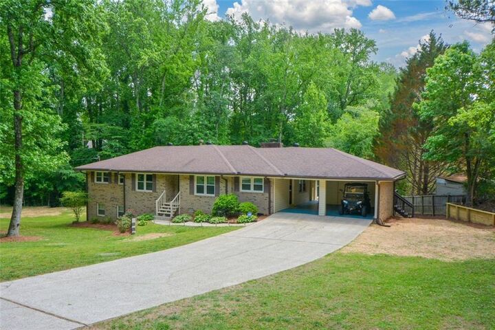 Property Photo:  5851 Wills Orchard Road  GA 30040 
