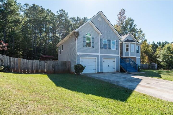 Property Photo:  404 Woodcreek  GA 30224 
