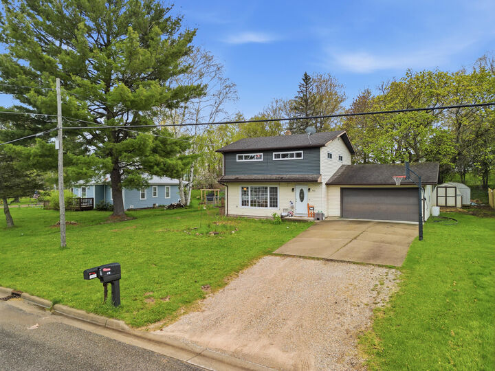 Property Photo:  413 W Church Avenue  MI 49677 