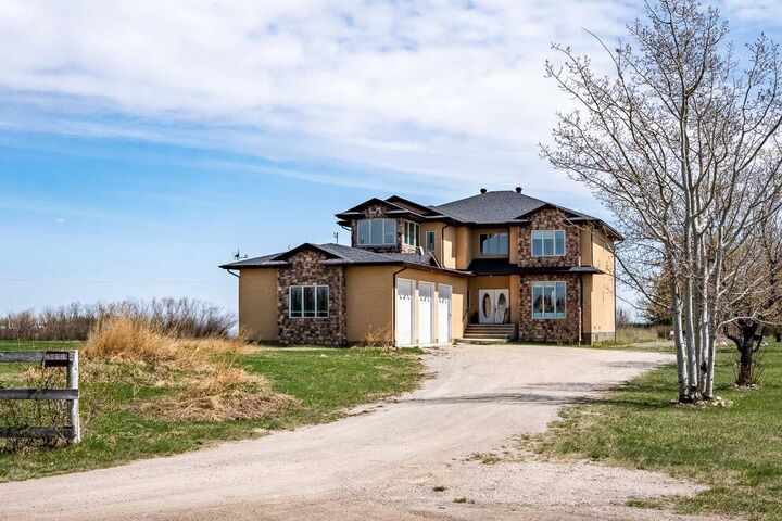 Property Photo:  280135 Township Road 242 SE  AB T1X 0M5 