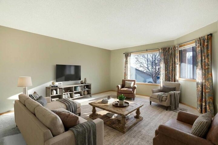 Property Photo:  118 Strathcona Road SW 8  AB T3H 1P3 