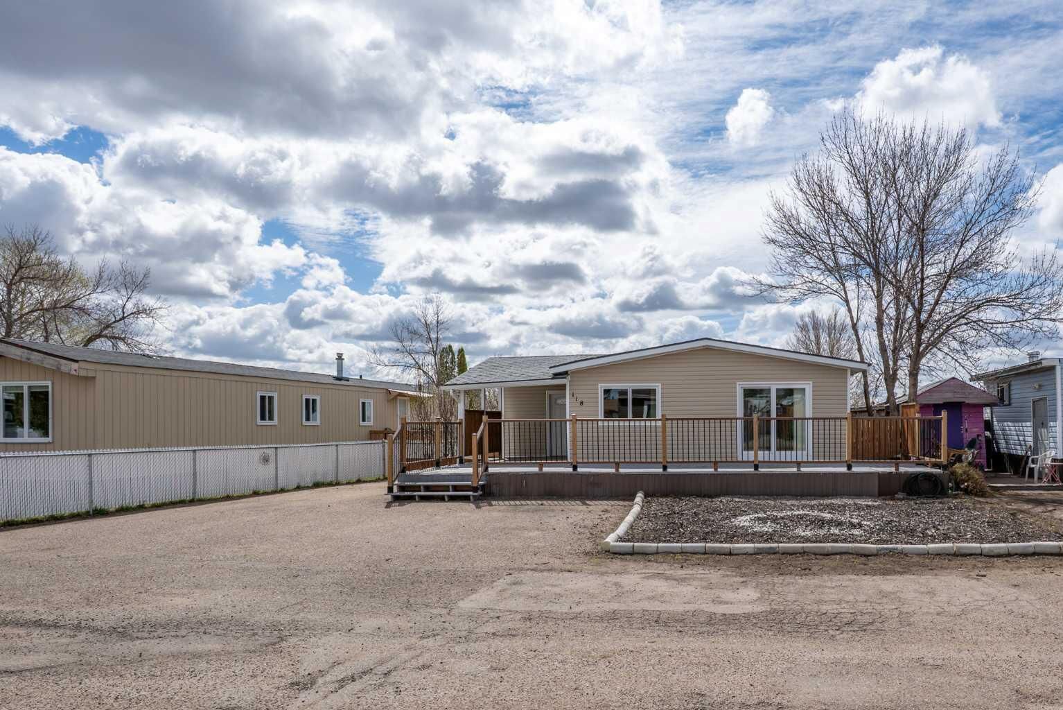 Property Photo:  118 Anson Avenue SW  AB T1A 8A3 