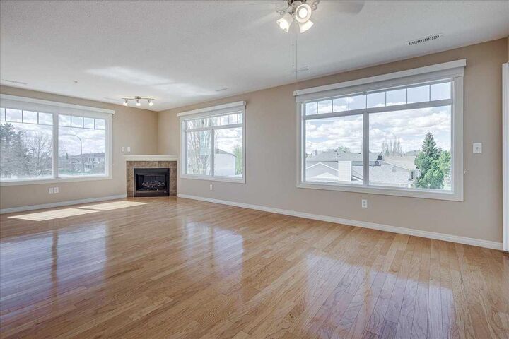 Property Photo:  4425 Heritage Way 201  AB T4L 2P4 