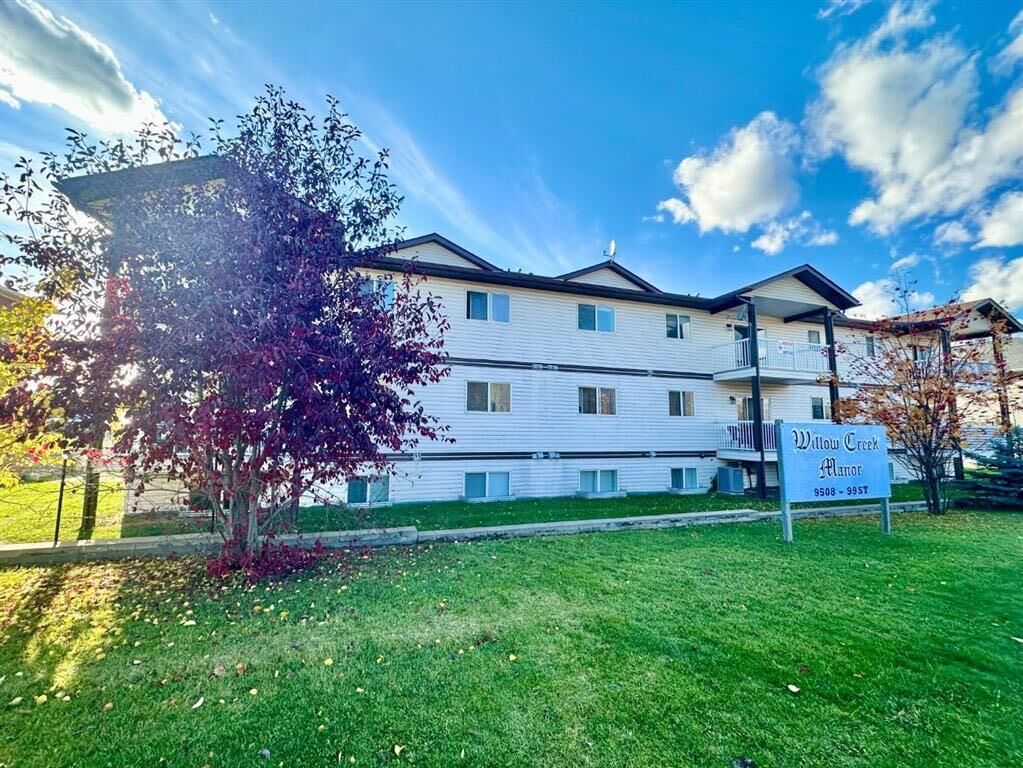 Property Photo:  9508 99 Street 101  AB T0A 2C0 