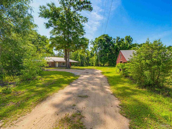 Property Photo:  4940 Dawson Rd  FL 32535 