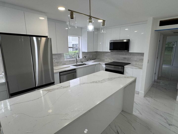 Property Photo:  216 Tuscany D  FL 33446 
