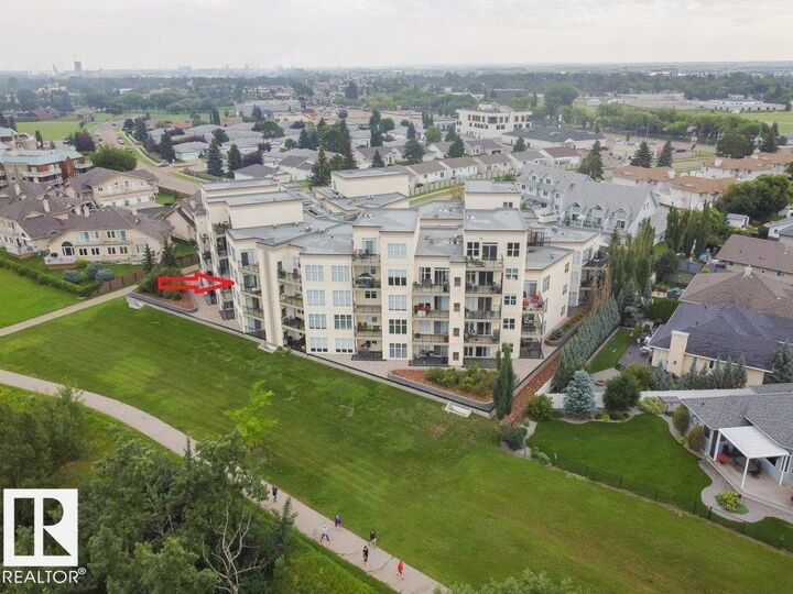 Property Photo: 9940 Sherridon Drive 308 AB T8L 4C9