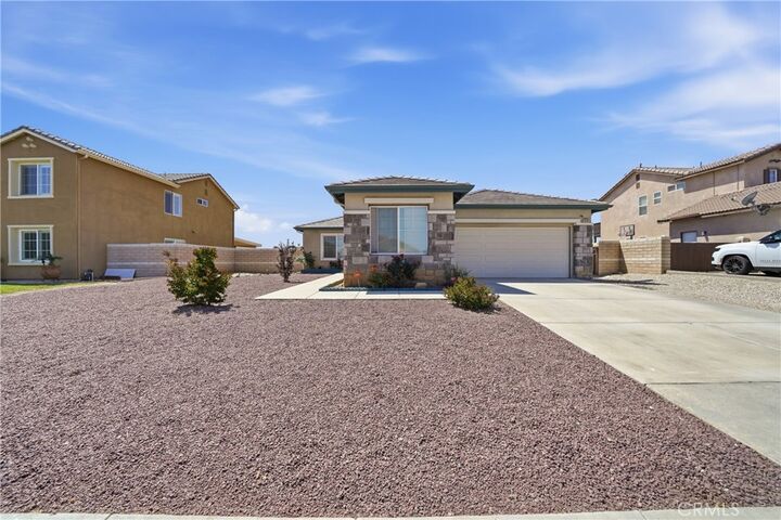 Property Photo:  13767 Buttermilk  CA 92392 