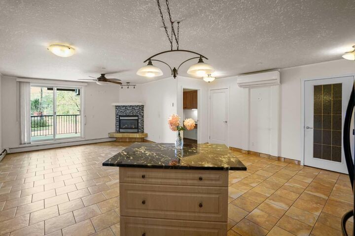 Property Photo:  4834 52A Street 101  AB T4V 1W4 