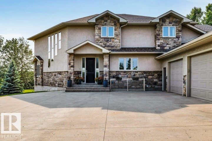 Property Photo: 19-51214 Rge Rd 260 AB T7Y 1B1
