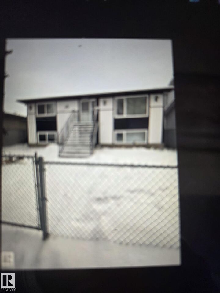 Property Photo:  11927 85 Street NW  AB T5B 3G2 