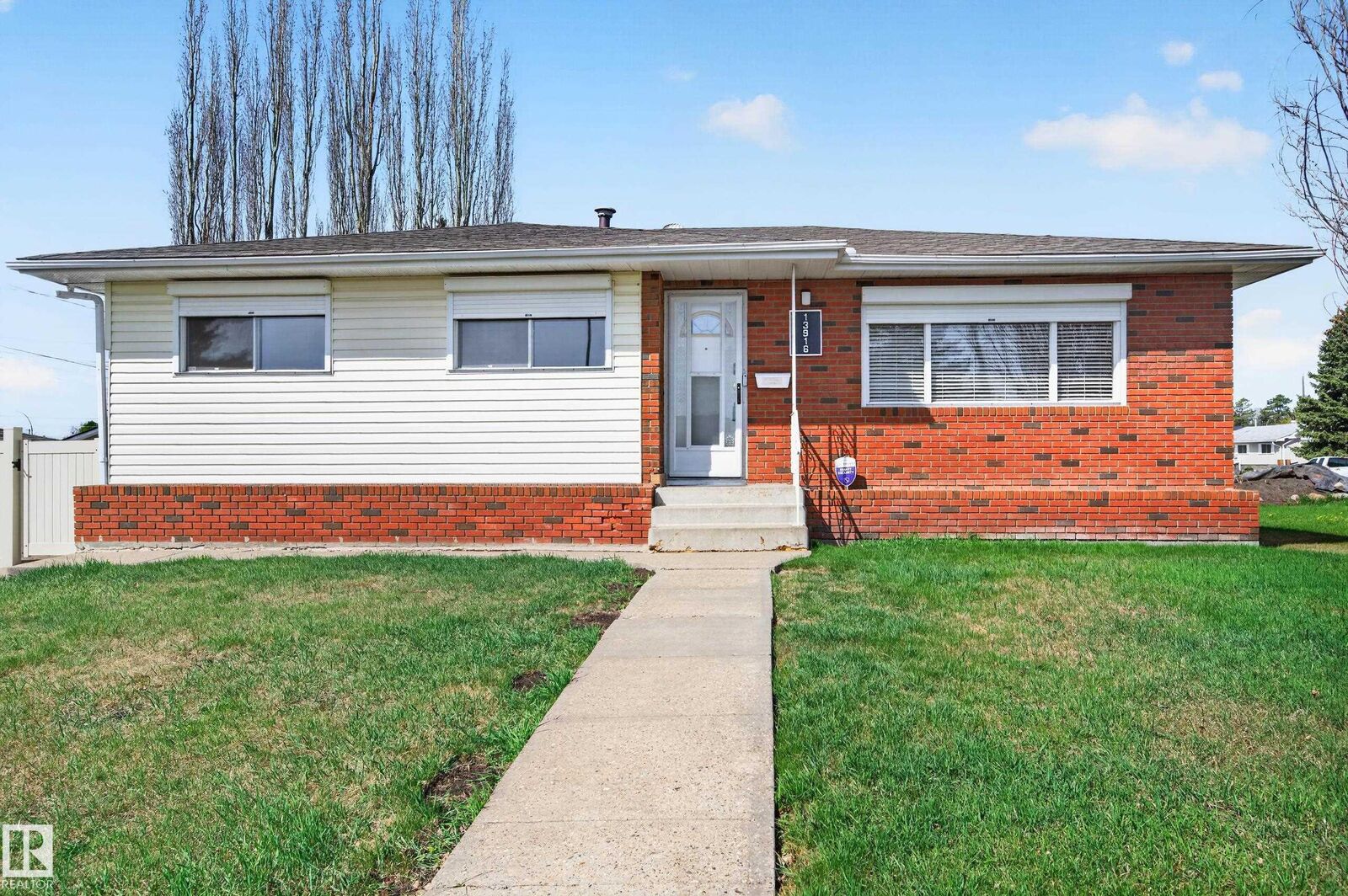 Property Photo:  13916 61 Street NW  AB T5A 1P2 