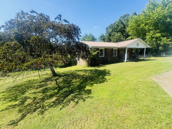 Property Photo:  785 Old Highway 79  TN 37058 