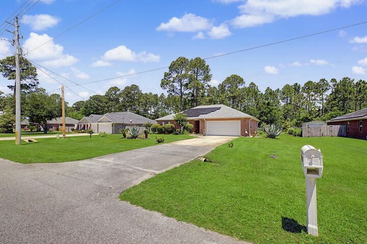 Property Photo:  7654 Manatee Street  FL 32566 