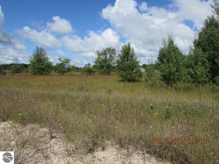 Property Photo:  Unit 3 Grouse Drive  MI 49646 