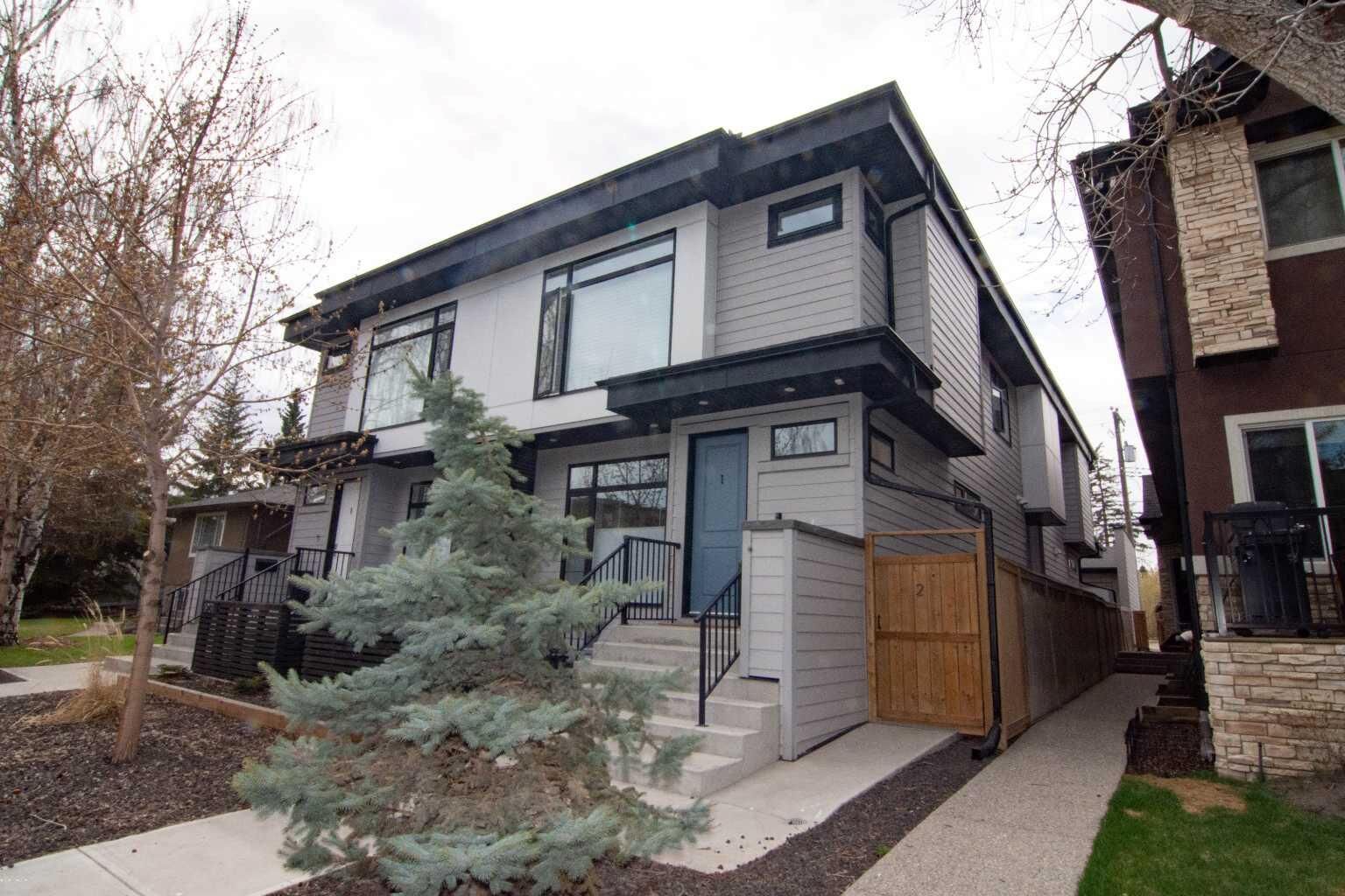 Property Photo:  1929 36 Street SW 2  AB T3E 2Y8 