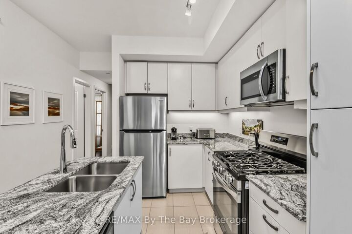 5 Spooner Crescent 311 — photo 1