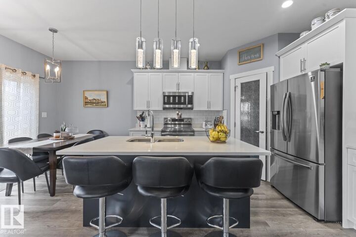 Property Photo:  6810A Tri City Way  AB T9M 0L3 