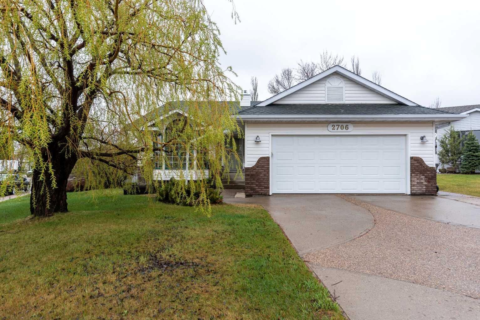 Property Photo: 2706 57B Avenue AB T9V 2M8