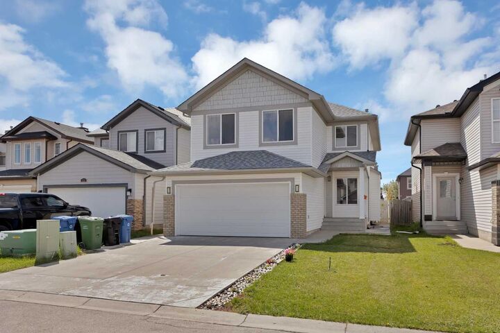 Property Photo:  218 Saddlefield Place NE  AB T3J 4Z3 