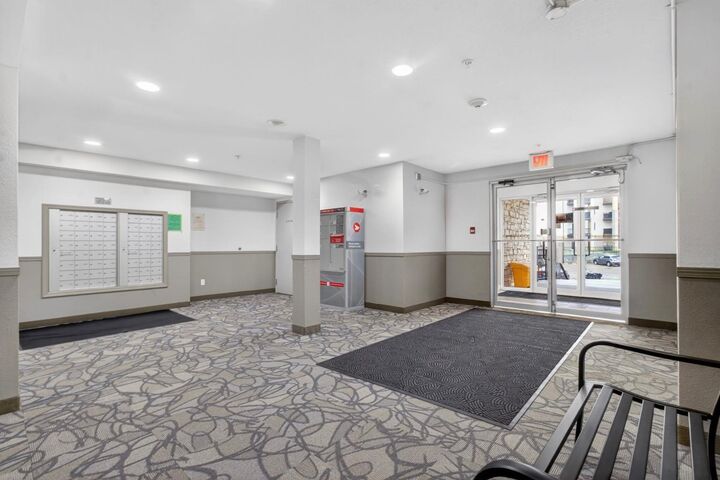 Property Photo:  304 Mackenzie Way SW 7103  AB T4B 3H7 