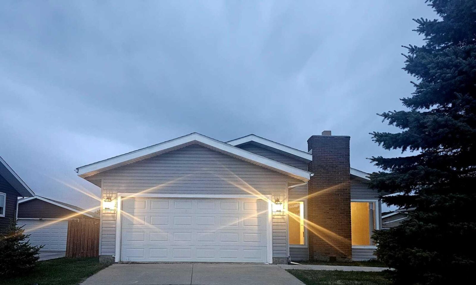 Property Photo:  112 Barrett Drive  AB T4R 1J3 
