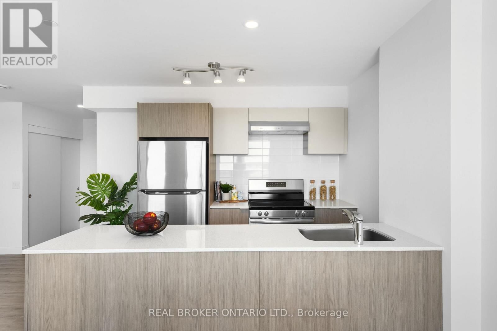 Property Photo:  100 Manett Crescent 209  ON L6X 4P7 