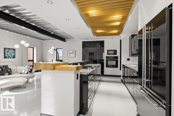 Property Photo:  8709 92A Avenue NW  AB T6C 4G6 