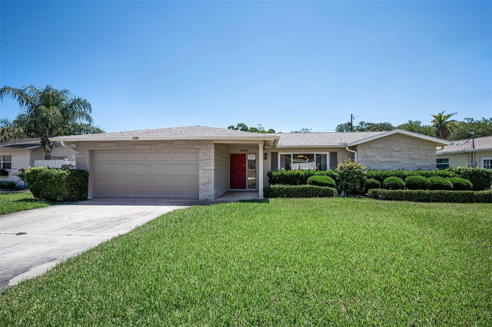 Property Photo: 9083 Briarwood Drive FL 33772