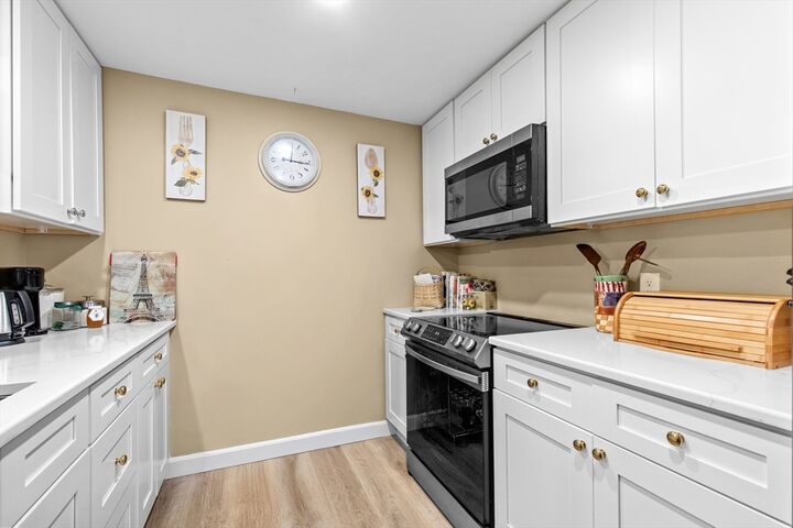 Property Photo:  1 Marc Dr. 1A11  MA 02360 