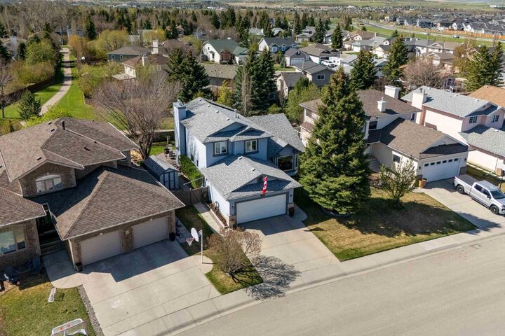 Property Photo:  76 Sunset Crescent  AB T1S 1P5 