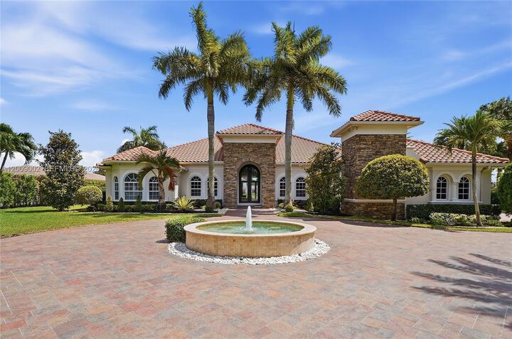 Property Photo:  14370 Jockey Cir N  FL 33330 