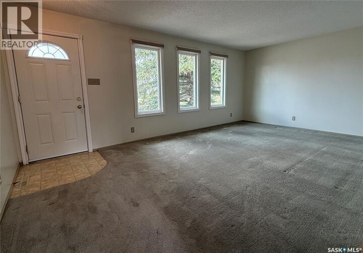 Property Photo:  723 Field Drive  SK S9H 4C4 