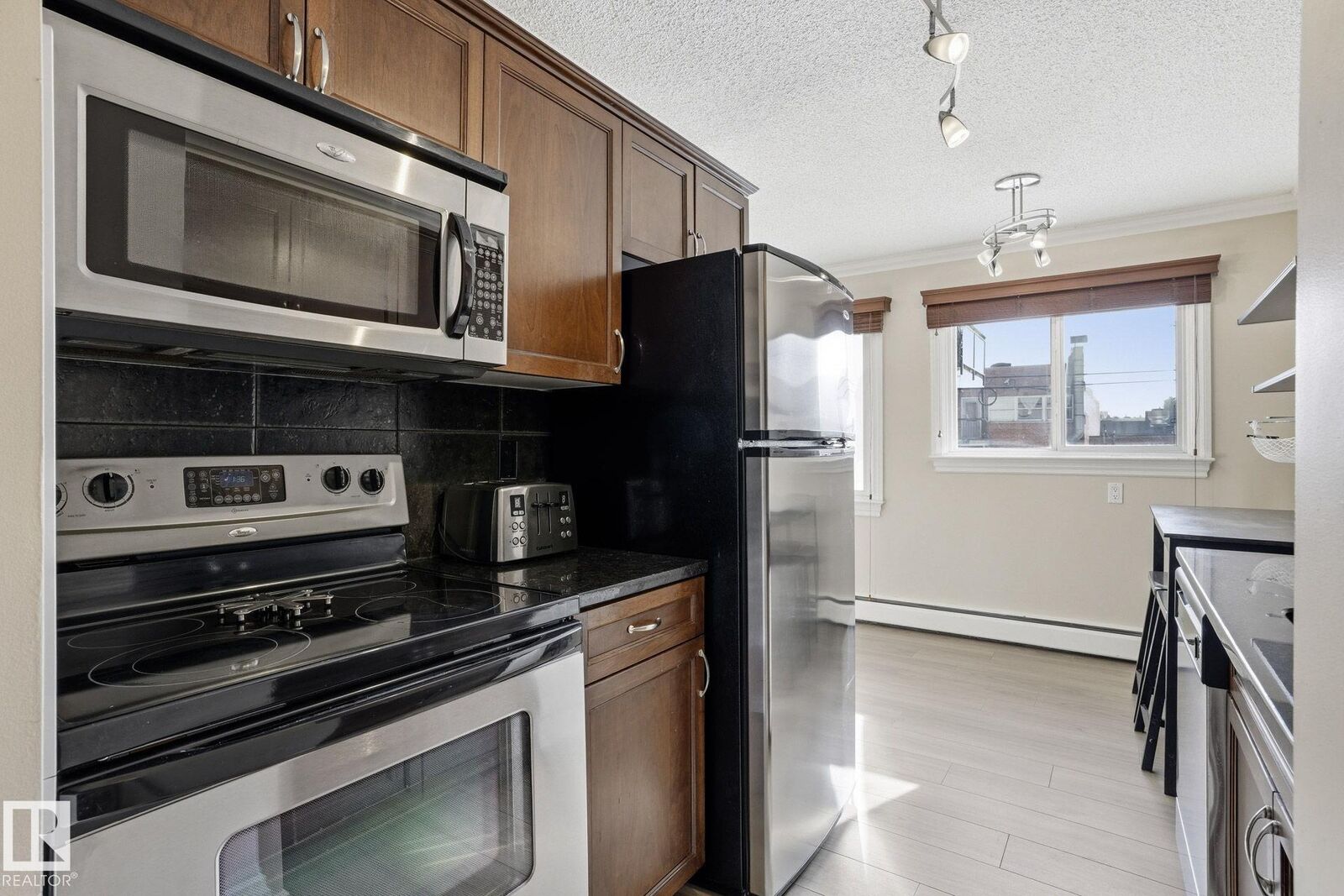 Property Photo: 10555 83 Avenue NW 202 AB T6E 2E1