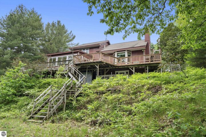 Property Photo: 10477 NE Black Bear Road MI 49646