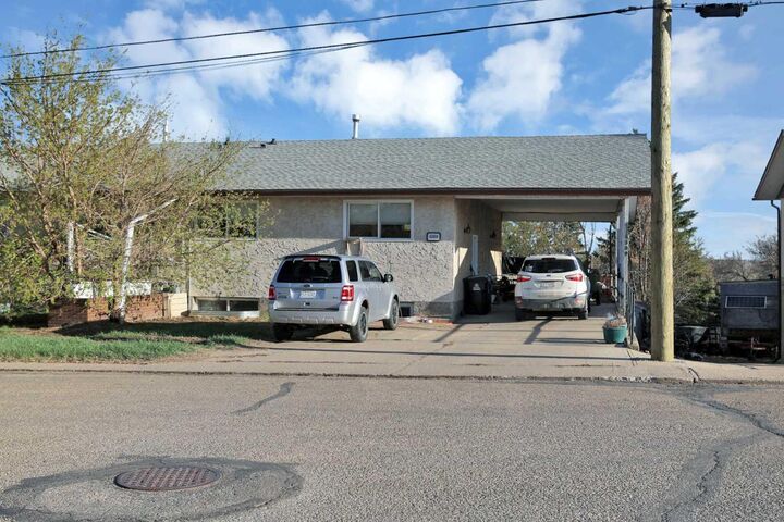 Property Photo:  5009 &Amp 5011 Shull Street  AB T0M 0J0 