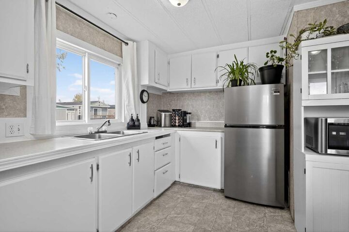 Property Photo:  6220 17 Avenue 328  AB T2A 7H4 