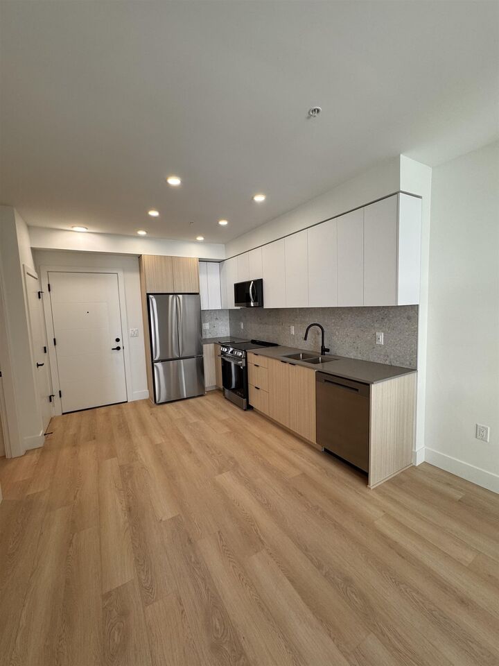 Property Photo:  13455 94A Avenue 303  BC V3V 0H3 