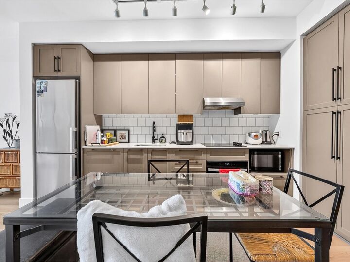 Property Photo:  8750 University Crescent 202  BC V5A 0G9 