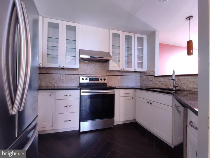 Property Photo:  7671 Coachlight Lane 21E-U  MD 21043 