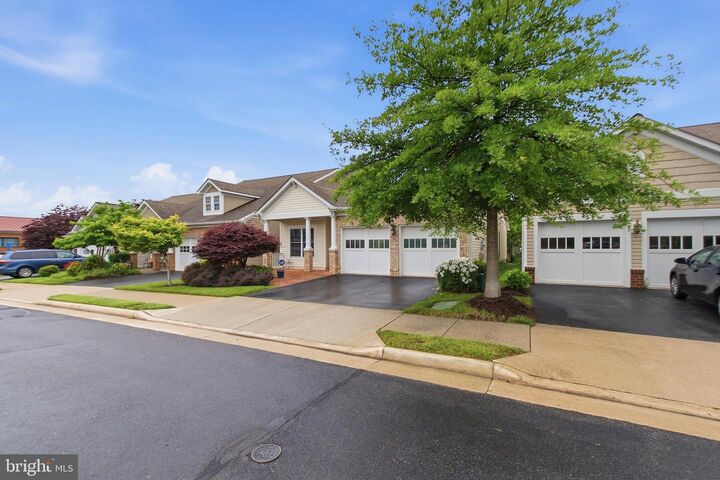 Property Photo:  8932 Pink Carnation Court  VA 22079 