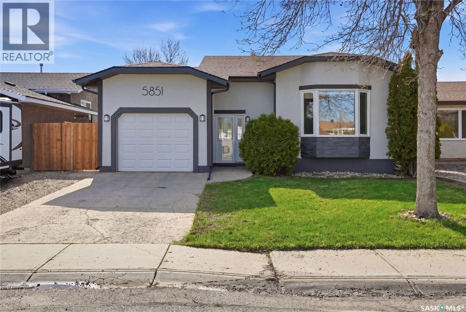 Property Photo:  5851 Ehrle Crescent  SK S4X 4C4 