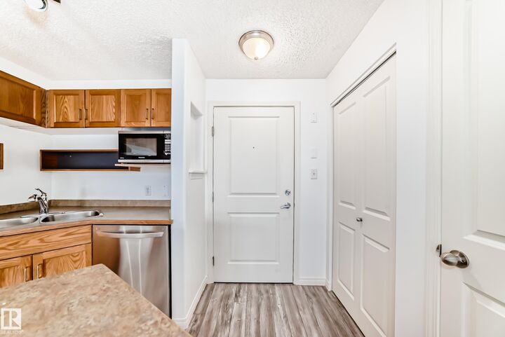 Property Photo:  2305 35A Avenue NW 210  AB T6T 1Z2 