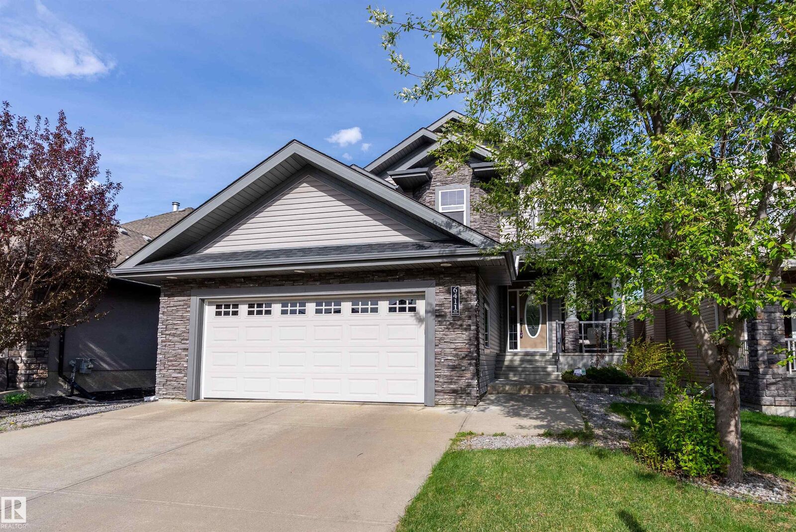 Property Photo: 6411 Mann Court NW AB T6R 0J1