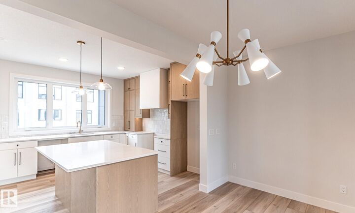 Property Photo: 7121 May Crescent NW 53 AB T6R 0X2